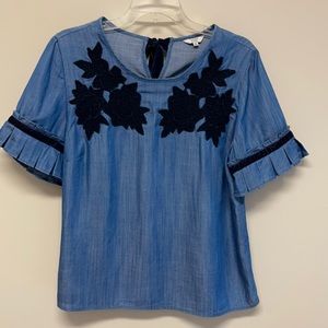 Crown & Ivy denim top with velvet floral appliqué accents & tie size M